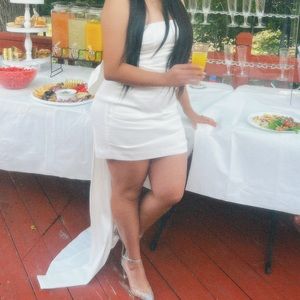 MRS. SHOW STOPPER RUCHED MINI DRESS WITH DETACHABLE BACK BOW